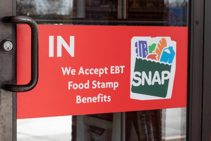 Ft. Wayne - Circa November 2021: SNAP and EBT Accepted here sign. SNAP and Food Stamps provide nutrition benefits to supplement the budgets of disadvantaged families.