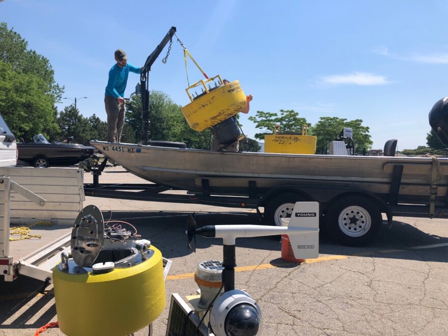 Buoys being loaded for deployment on the bay of Green Bay.