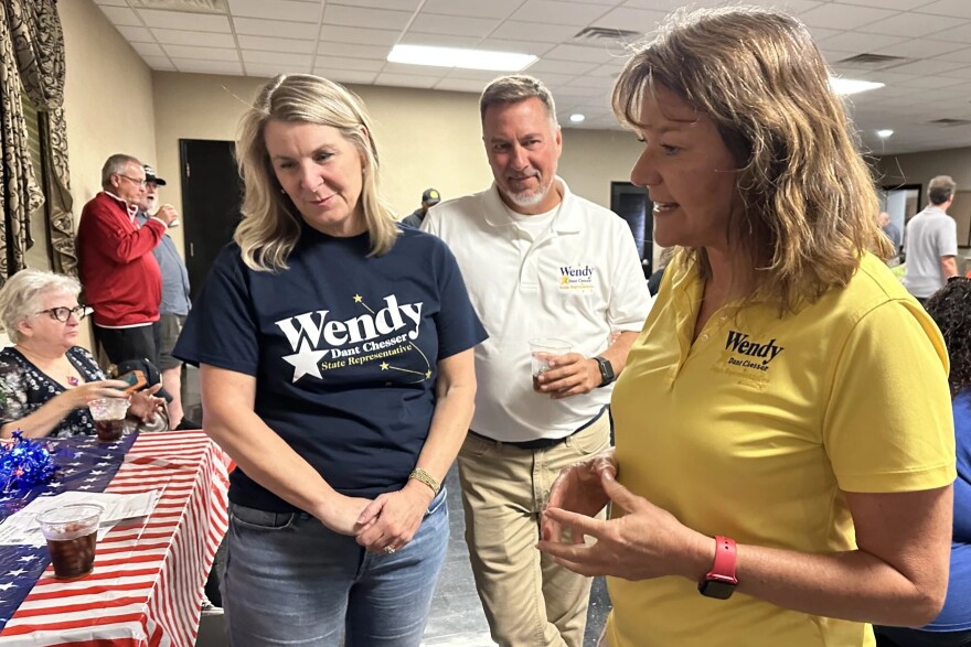 Democrat Wendy Dant Chesser talks with supporters at a watch party in Clark County on election night.
