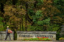 A student walks past a Cornell University sign in Ithaca, N.Y., Monday, Sept. 28, 2026.