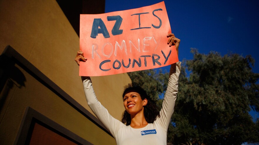 A supporter at a Mitt Romney rally Monday in Mesa, Ariz. The city was founded by Mormons and has a large Mormon population. 