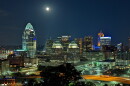 The moon shines over Downtown Cincinnati, early on the morning of July 14, 2022.