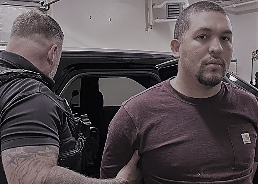This image provided by U.S. Immigration and Customs Enforcement (ICE) shows former Brazilian military police officer Antonio Jose De Abreu Vidal Filho, right. The former military police officer who was convicted of multiple murders and sentenced to more than 200 years in prison for his part in a 2015 Brazilian massacre was arrested Monday, Aug. 14, 2023, in Rye, N.H, immigration officials said. (U.S. Immigration and Customs Enforcement via AP)