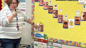 Heather Mock, a first-grade teacher at Washington Elementary School in Wichita, focuses on letter sounds and combinations during a reading lesson.