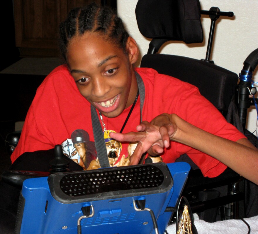 Tres Whitlock types on the DynaVox tablet that serves as his voice. Whitlock, 17, has cerebral palsy and can't speak on his own. StateImpact Florida reported on the difficulty Whitlock, and other special needs kids, have had trying to enroll in Florida charter schools.