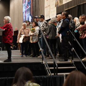 Anna Frank accepts the Citizen of the Year Award at the 2025 Alaska Federation of Natives Convention.