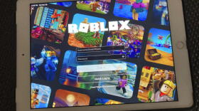 The gaming platform Roblox is displayed on a tablet, Oct. 30, 2021, in New York.  (Leon Keith/AP)