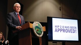 Then-Indiana Gov. Mike Pence announces that the Centers for Medicaid and Medicare Services has approved the state's waiver request for its Medicaid plan in 2015.