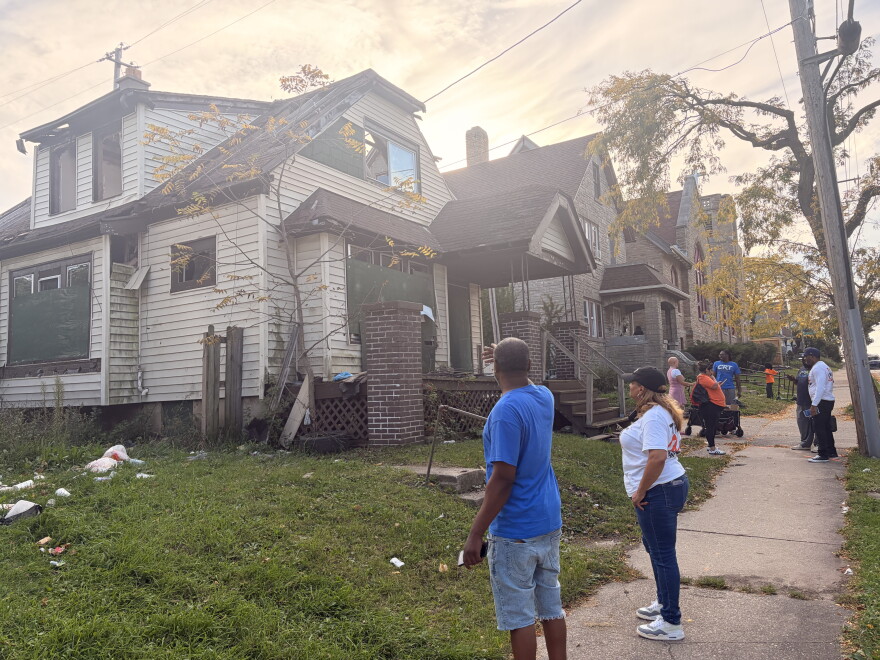 During the latest community walk, staff with the Department of Community Wellness and Safety and the Critical Response Team document a vacant home in the Harambee neighborhood.