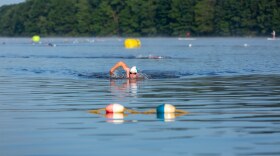 A swimmer competes during a triathlon at Harveys Lake in Luzerne County.