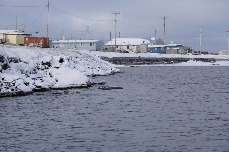 Kaktovik houses along a reinforced but eroding shoreline are seen after the season’s first significant snowfall on Sept. 24, 2018.