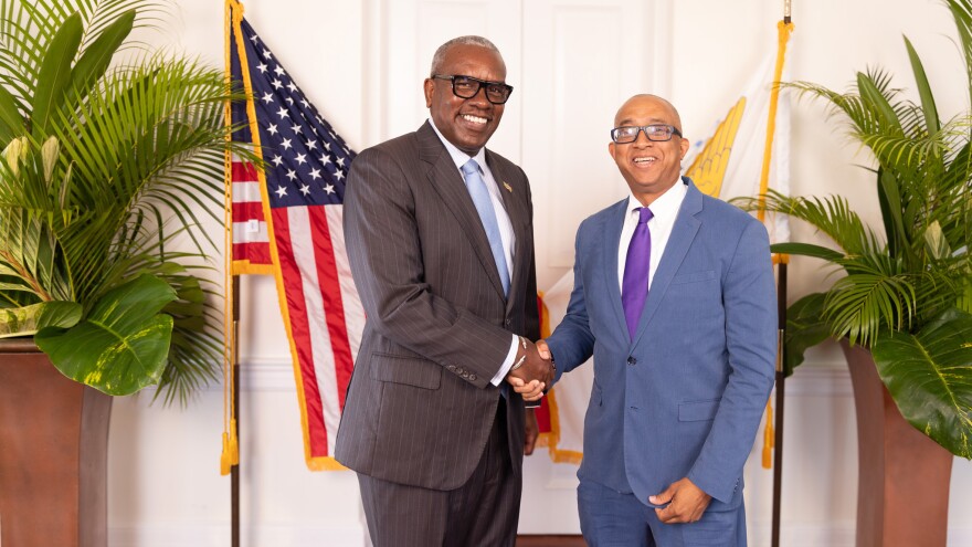 Pictured: Governor Albert Bryan Jr and IRB Director Joel Lee