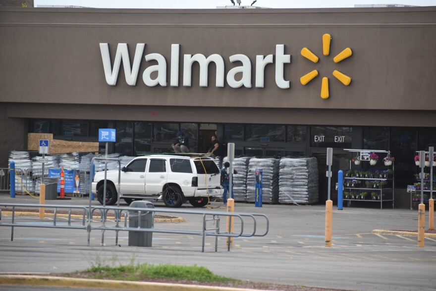 The Walmart on University is barricaded and closed Monday and Tuesday after looting.
