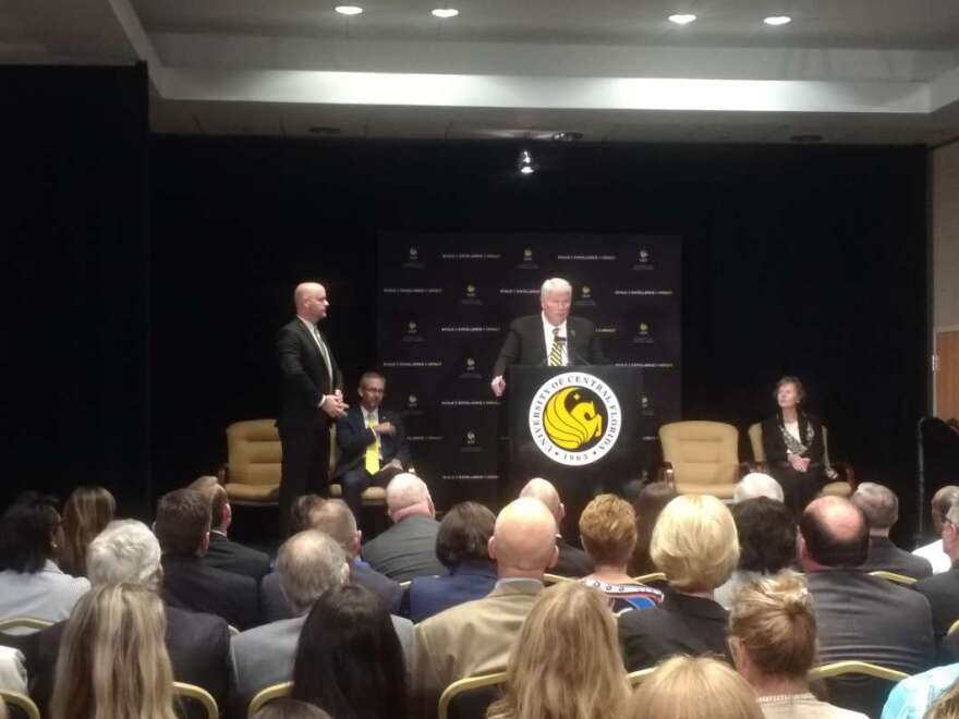 UCF President John C. Hitt announces his decision to retire at a press conference. Photo: Fernando Narro