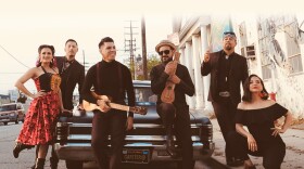 Promotional photo depicting band members and artivists of Las Cafeteras.