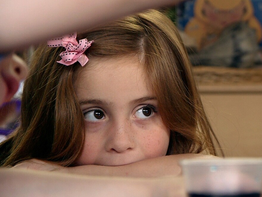 Preschool student Stormy Frazier watches a science experiment unfold in Nikki Jones' classroom in Tulsa, Okla. <a href="http://www.npr.org/2014/04/22/304563233/what-exactly-is-high-quality-preschool">You can learn more about preschool in Tulsa here</a>.