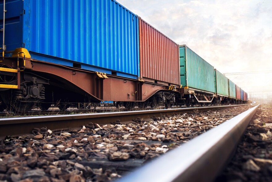 Train wagons carrying cargo container