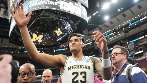 Michigan's Yaxel Lendeborg (23) celebrates after defeating Tennessee in the Elite Eight of the NCAA college basketball tournament, Sunday, March 29, 2026, in Chicago.