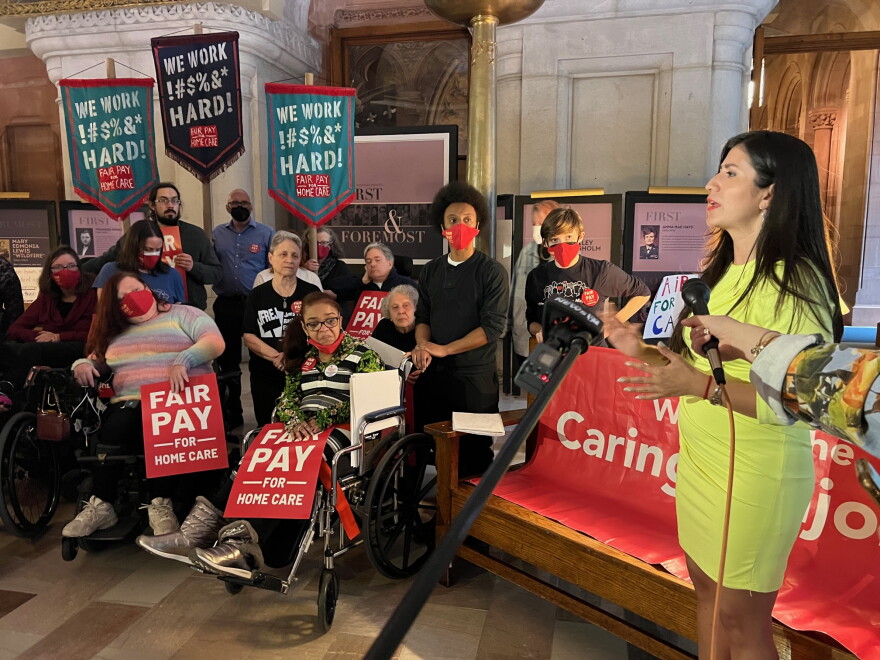  Senator Jessica Ramos speaks to home health care advocates camped outside Governor Hochul's office on March 31, 2022