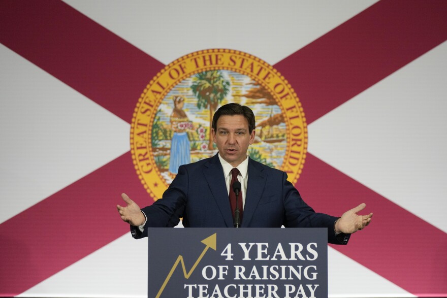 Florida Governor Ron DeSantis speaks during a news conference to sign several bills related to public education and increases in teacher pay, in Miami, Tuesday, May 9, 2023. (AP Photo/Rebecca Blackwell)