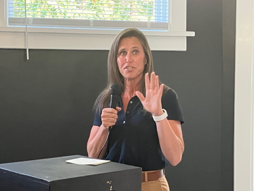 John Deere Foundation president Taryn Edgin speaks at Rejuvenate Housing's open house Tuesday, Sept. 8, 2026.