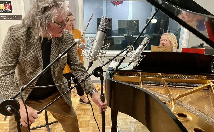 Chuck "Chubby" Smith adjusting a microphone boom inside KPR's Live Performance Studio as part of KPR's LIVE DAY 2022.