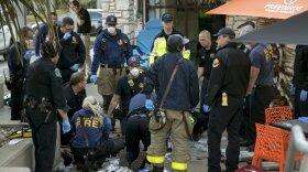 Paramedics perform CPR