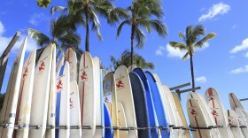 FILE - Surfboards line the Waikīkī Beach, Thursday, June, 23, 2022 in Honolulu.