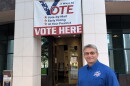 Leon County Elections Supervisor Mark Earley stands before the Leon County Courthouse early voting site.