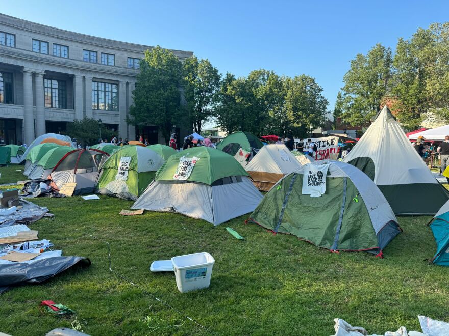 Tents in a line on the grass at Case Western Reserve University.