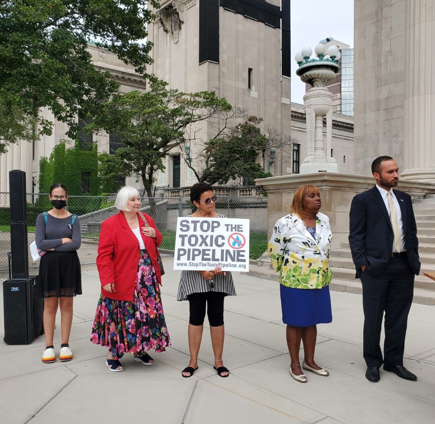  Opponents of an Eversource pipeline project speak on the steps of city hall in Springfield, Massachusetts. 