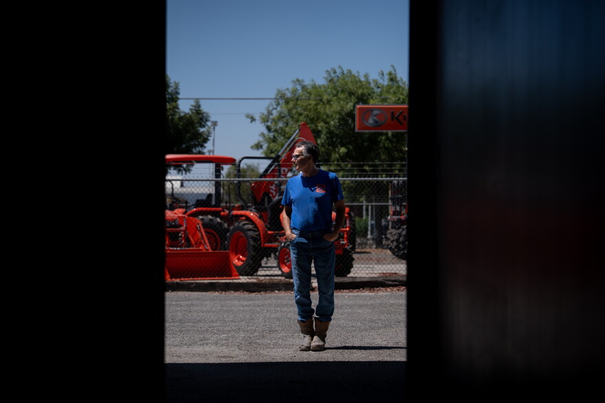 Scott Alcoser, a parts manager at a farm equipment retailer, stands for a photo in Hanford, Calif., Friday, Aug. 21, 2026.