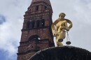 The 1890s Bexar County Courthouse features Lady Justice fountain at its main entrance with a towering "beehive" dome spiraling above