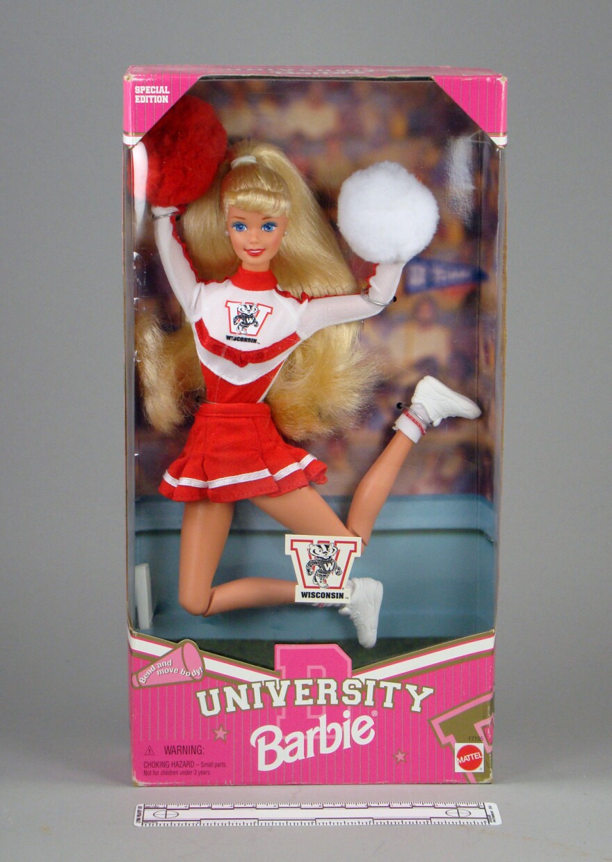 This is University Barbie, dressed as a UW-Madison cheerleader. This doll in the Wisconsin Historical Society's collection belonged to a girl from Brookfield, Wis.