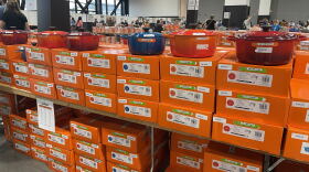 Dutch ovens on sale line tables at the Le Creuset factory-to-table sale in Milwaukee on Oct. 1, 2026 at the Baird Center.
