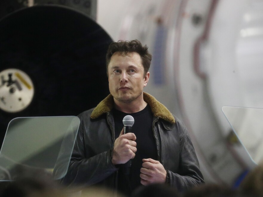 Tesla CEO Elon Musk speaks at a news conference at SpaceX headquarters on Sept. 17 in Hawthorne, Calif.