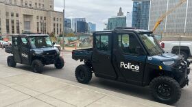 Two of KCPD's Utility Task Vehicles on display in front of their downtown headquarters. 