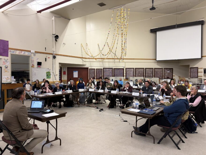 Paul Reid, with the Office of Education Advocacy with the Alaska Department of Education and Early Development (left) presents the special ad hoc committee's recommendations for Mt. Edgecumbe to the state Board of Education at their fall meeting in Sitka on Oct. 14, 2026.