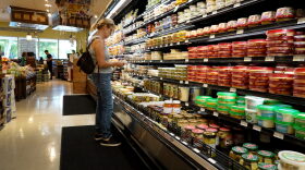 A shopper makes their way through a grocery store in Miami, Florida. 