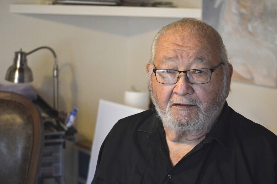 FILE - Kiowa writer N. Scott Momaday, who won a Pulitzer Prize in 1969 for his groundbreaking novel "House Made of Dawn," appears at his home in Santa Fe, N.M., on Nov. 13, 2019. Momaday died Jan. 24 at his home in Santa Fe, New Mexico, publisher HarperCollins announced. He had been in failing health. (AP Photo/Russell Contreras, File)