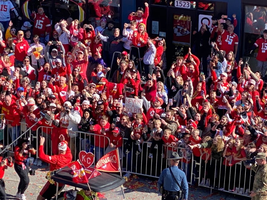 Kansas City Chiefs tight end Travis Kelce on a golf cart during the Super Bowl victory parade on Feb. 14, 2024.