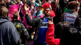 May Day demonstrators dance to music by DJ Sean Malik during "Hip Hop Occupies" at Westlake Park Tuesday morning.