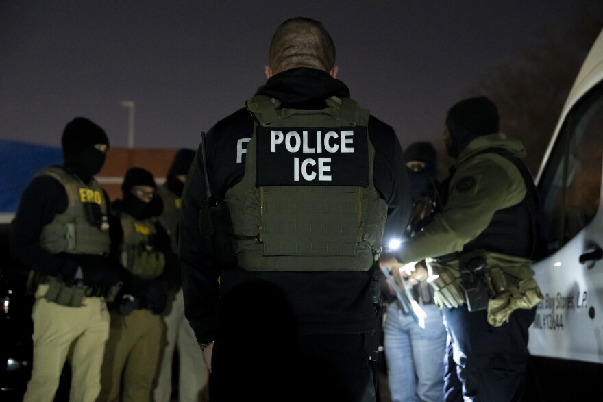 FILE - U.S. Immigration and Customs Enforcement officers gather for a briefing before an enforcement operation, Jan. 27, 2025, in Silver Spring, Md.