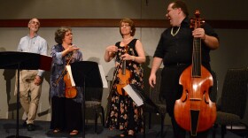 Jack Ashworth, Tina Chancey, Lisa Terry and Phillip Serna perform Sunday during the closing banquet of the weeklong conclave at the University of Delaware in Newark, Del.