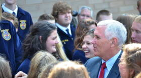 Gov. Mike Pence greets FFA delegates at the organization's national headquarters Wednesday.