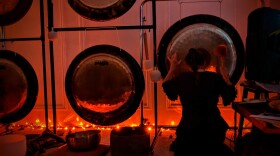 Jodi Roberts of Plano incorporates gongs into the sound therapy she offers clients.