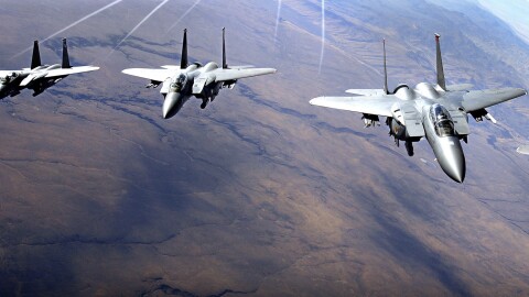 A group of U.S. Air Force F-15 aircraft flying in formation near Mountain Home Air Force Base, Idaho.
