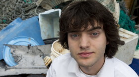 Dutch university dropout Boyan Slat, who founded the The Ocean Cleanup, poses for a portrait next to a pile of plastic garbage prior to a press presentation in Utrecht, Netherlands, Thursday, May 11, 2017. The foundation aiming to rid the world's oceans of plastic says it will start cleaning up the huge patch of floating junk known as the Great Pacific Garbage Patch within the next 12 months, two years ahead of schedule. (Peter Dejong/AP)