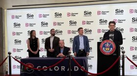 Yancey Strickler, co-founder of the crowdfunding platform Kickstarter, speaks at a bill signing for Senate Bill 133, which creates a new business structure in Colorado tailored to artists. Strickler came up with the idea and gave a TED talk on the concept in 2025. Colorado is the first state to enact the new structure, a subset of a limited liability corporation.