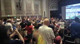 Team USA fans erupted in applause at the Kentucky Theatre after USMNT scored its first, and only goal against Belgium Monday night.